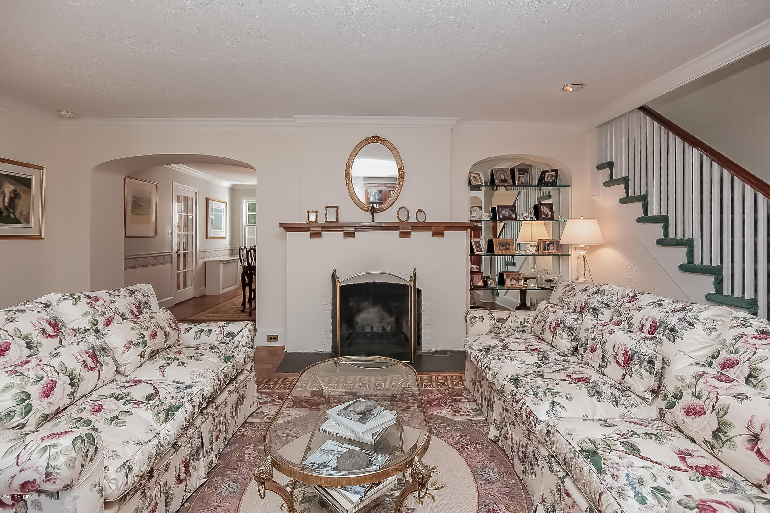 26 Meadow Road Riverside, CT 06878 - Photo 5 of 24 a living room with a fireplace furniture and a fireplace