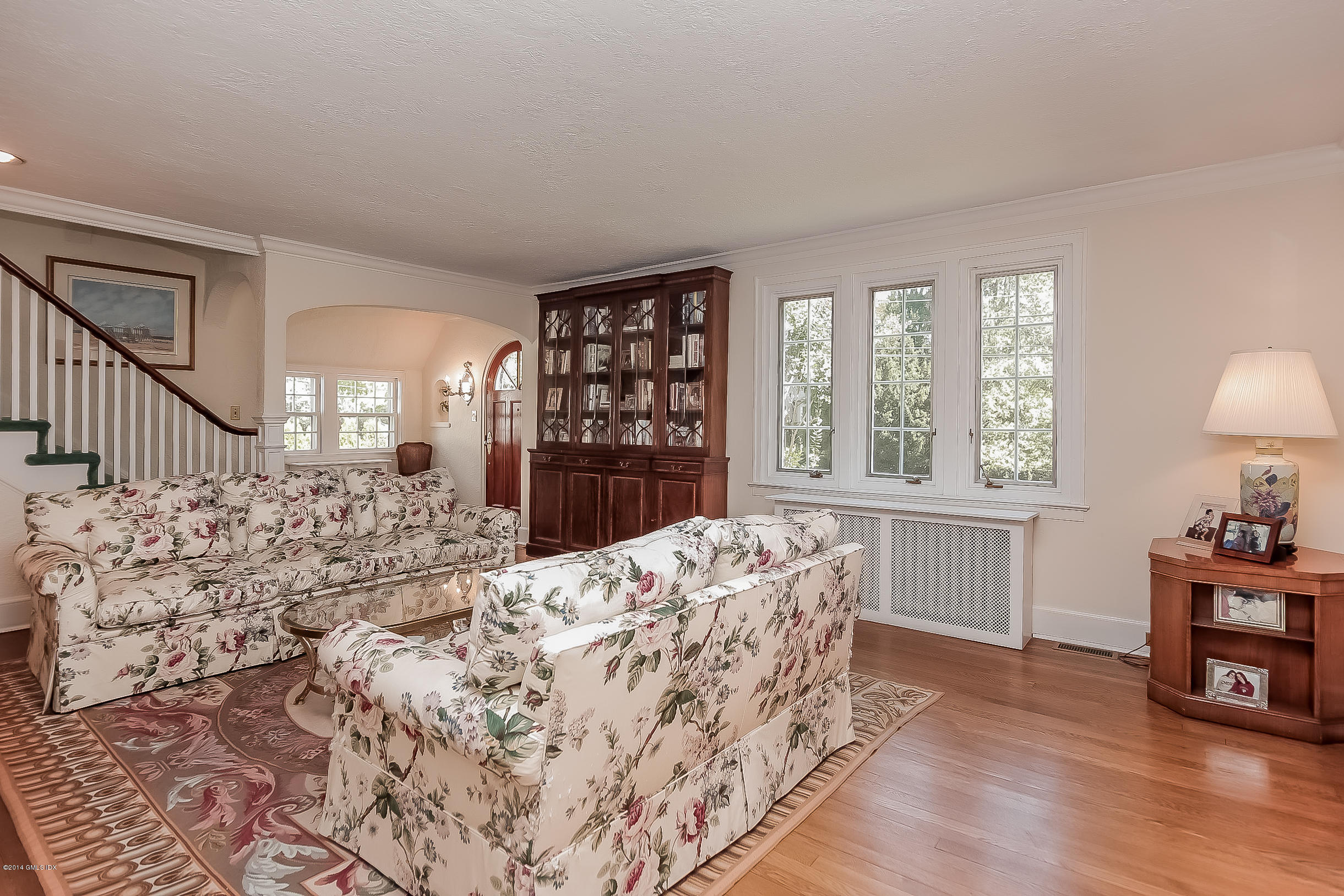 26 Meadow Road Riverside, CT 06878 - Photo 6 of 24 a bed sitting in a bedroom next to a window