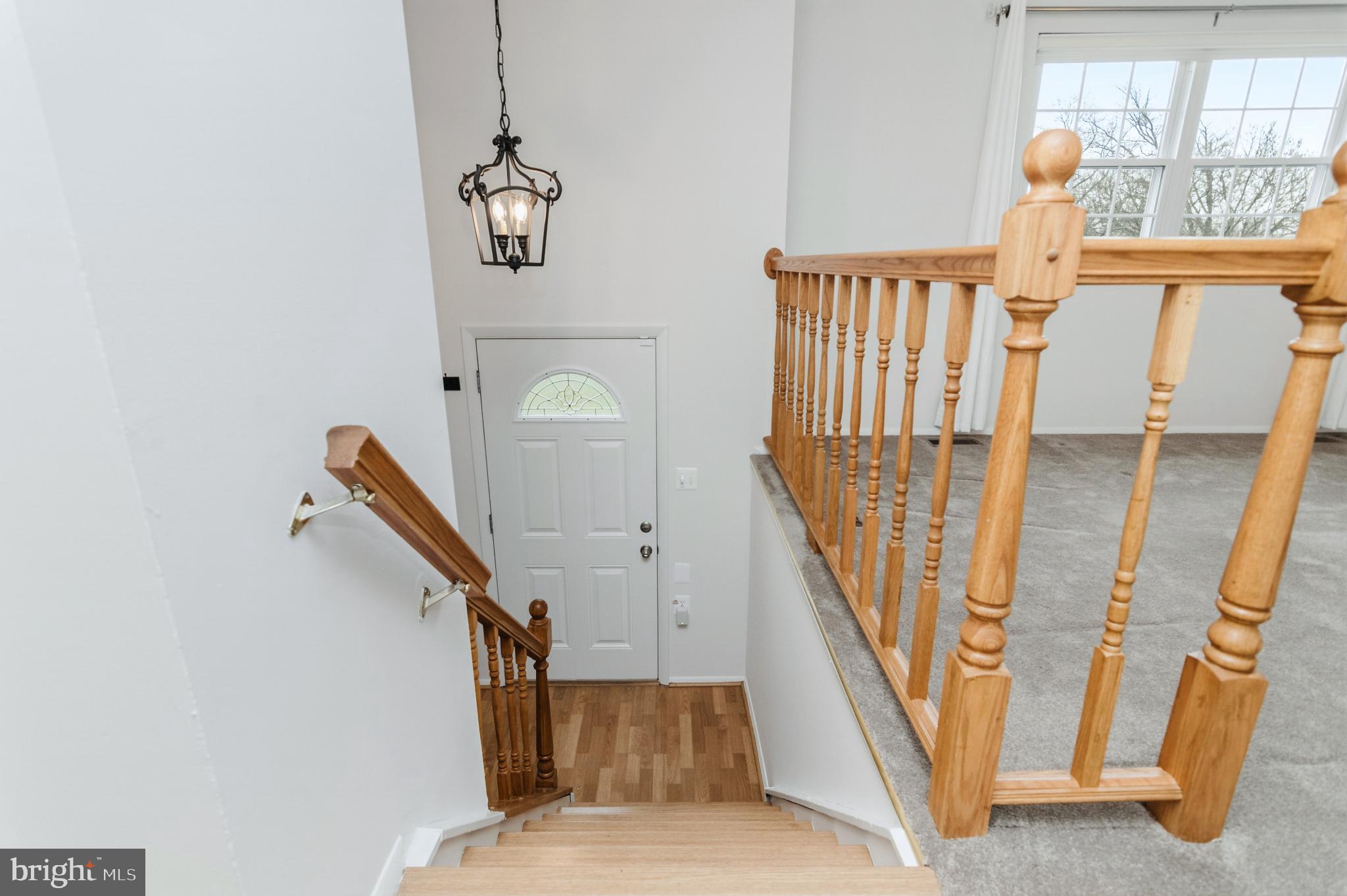 2806 Logway Road Vienna, VA 22181 - Photo 24 of 42 a view of entryway and hall with wooden floor