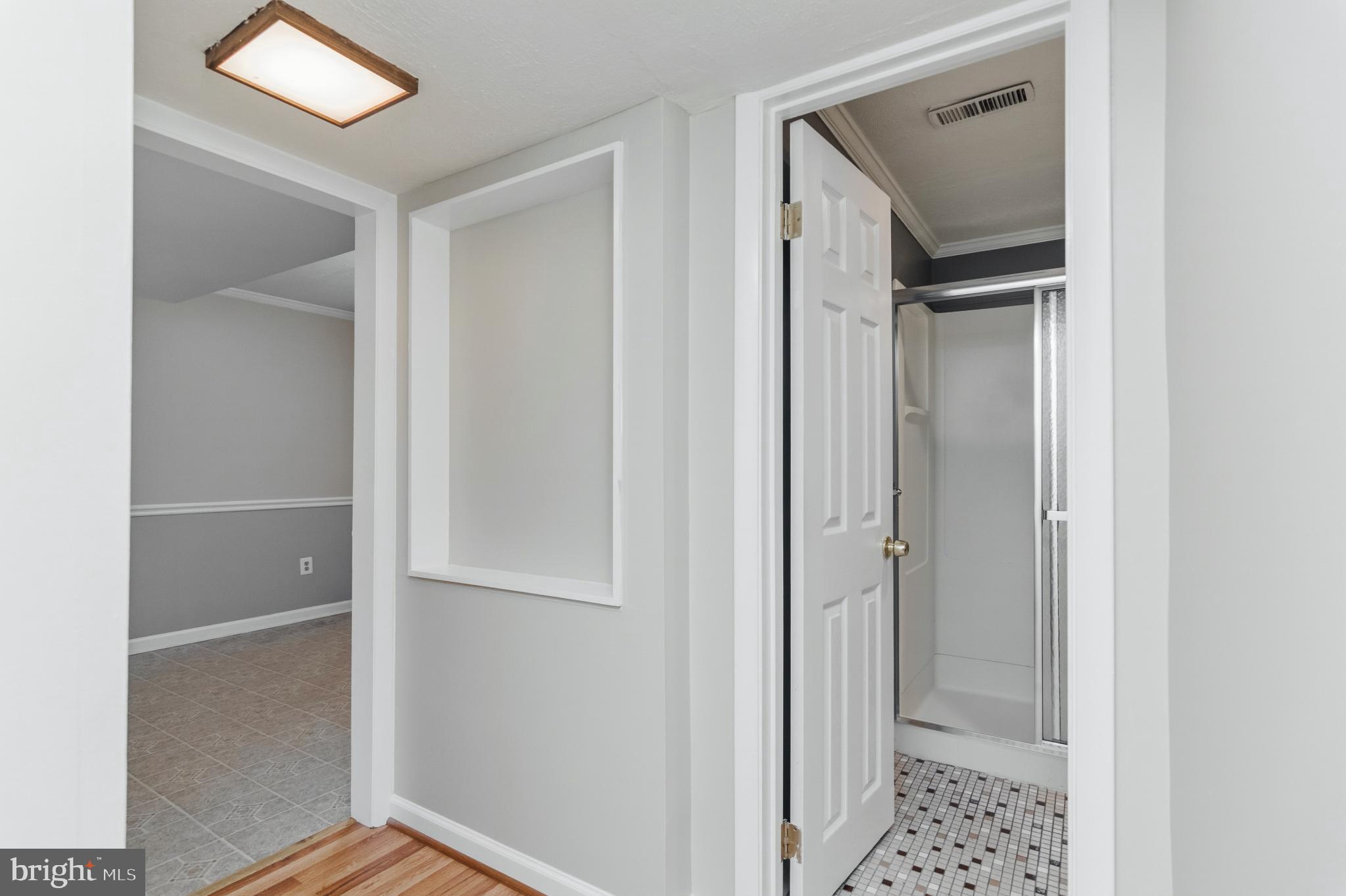 2806 Logway Road Vienna, VA 22181 - Photo 28 of 42 a view of closet with wooden floor
