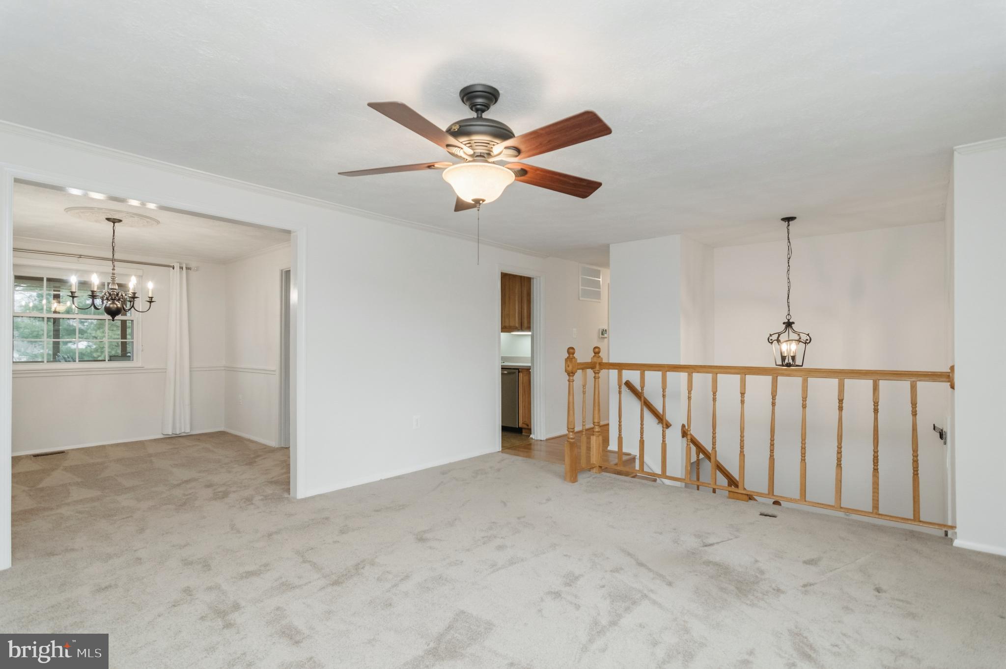 2806 Logway Road Vienna, VA 22181 - Photo 5 of 42 a view of a livingroom with a ceiling fan and window