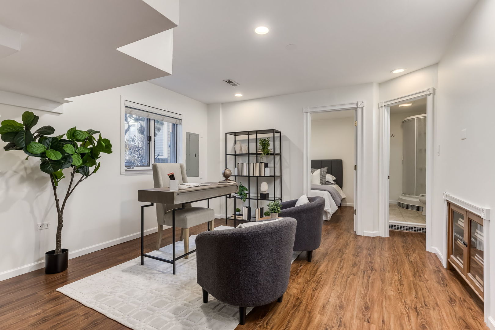 1251 West Fletcher Street, Unit J Chicago, IL 60657 - Photo 20 of 30 a living room with furniture and a potted plant