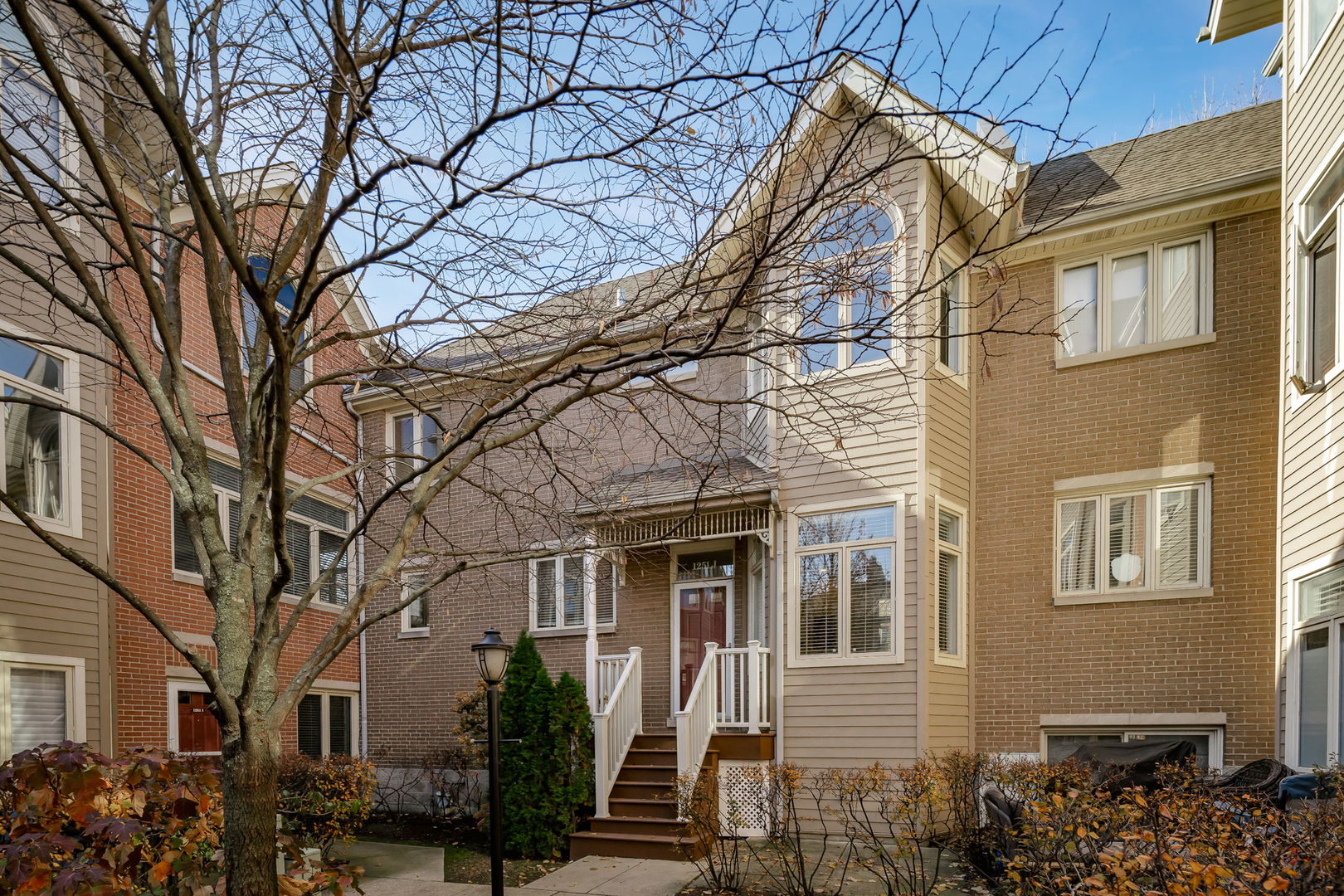 1251 West Fletcher Street, Unit J Chicago, IL 60657 - Photo 2 of 30 a view of a house with a yard
