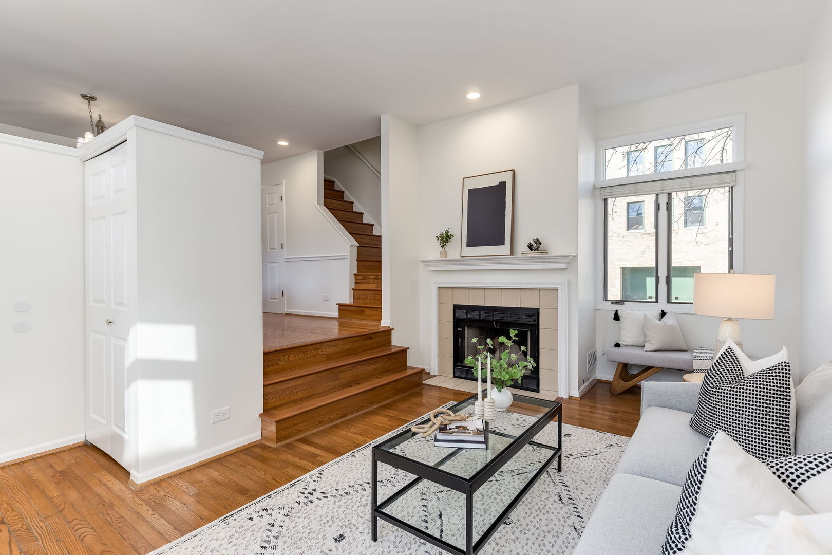 1251 West Fletcher Street, Unit J Chicago, IL 60657 - Photo 6 of 30 a living room with furniture and a fireplace