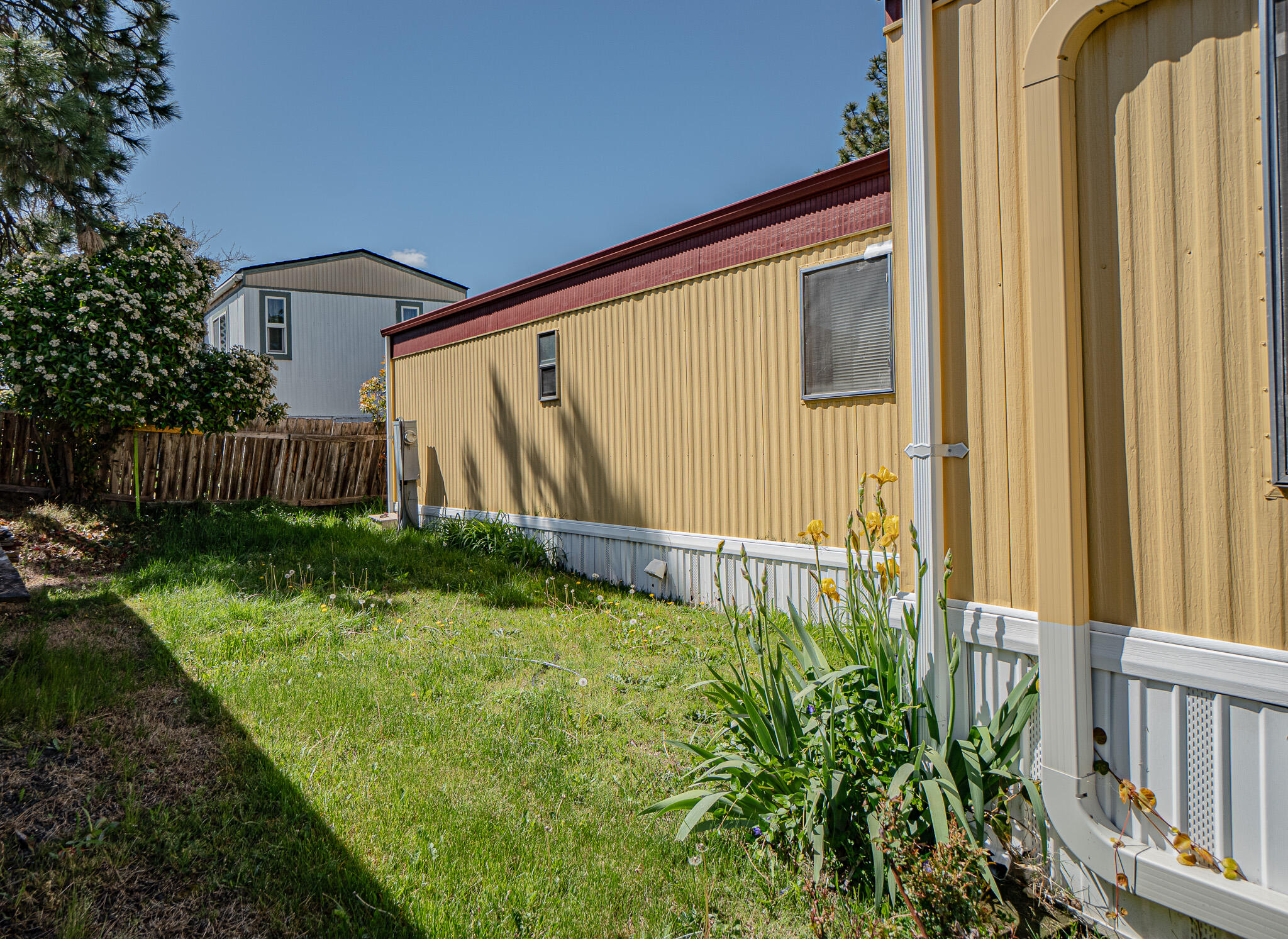 421 Stevens Road, Unit 26 Eagle Point, OR 97524 - Photo 20 of 23 a front view of a house with garden