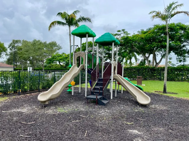 a view of a park with slide