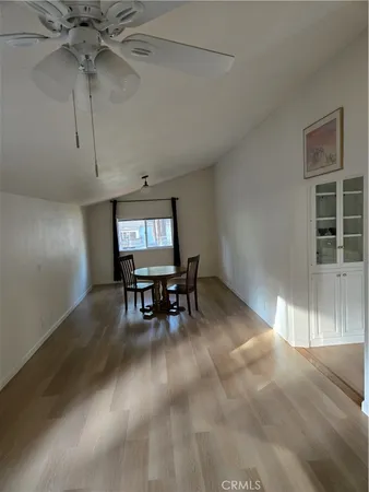 a view of work space with furniture and window