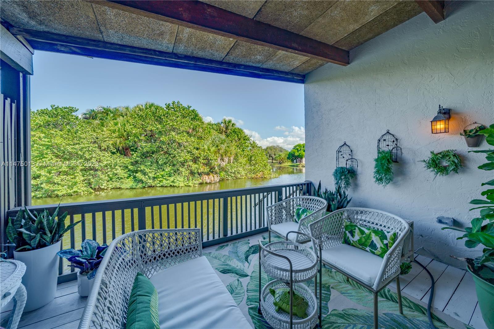 950 Mockingbird Lane, Unit 609A Plantation, FL 33324 - Photo 19 of 64 a view of a balcony with furniture