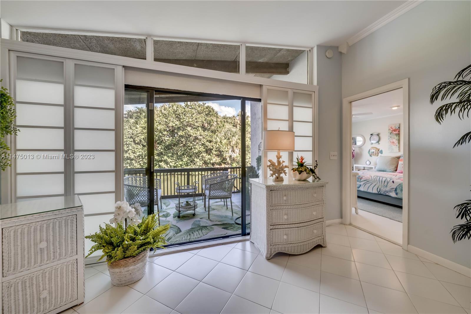 950 Mockingbird Lane, Unit 609A Plantation, FL 33324 - Photo 22 of 64 a room with a stairs and furniture