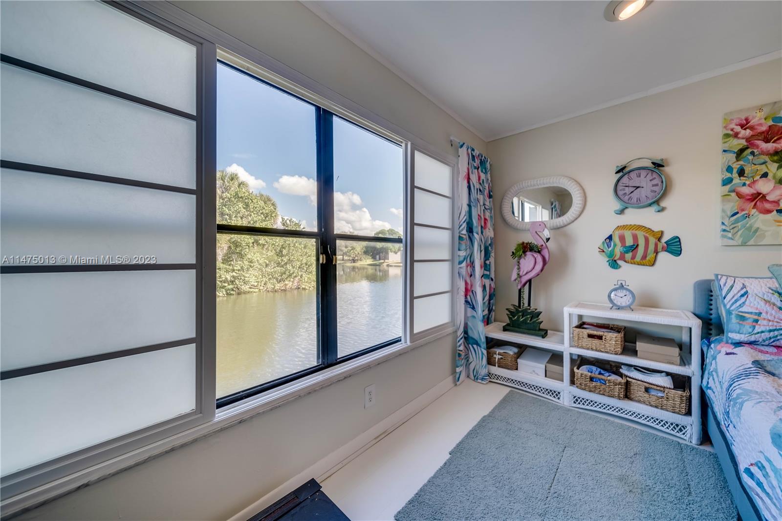 950 Mockingbird Lane, Unit 609A Plantation, FL 33324 - Photo 27 of 64 a view of a livingroom with furniture and window