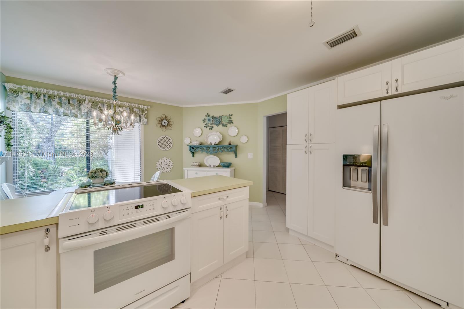 950 Mockingbird Lane, Unit 609A Plantation, FL 33324 - Photo 37 of 64 a bathroom with a granite countertop sink a large mirror and a shower