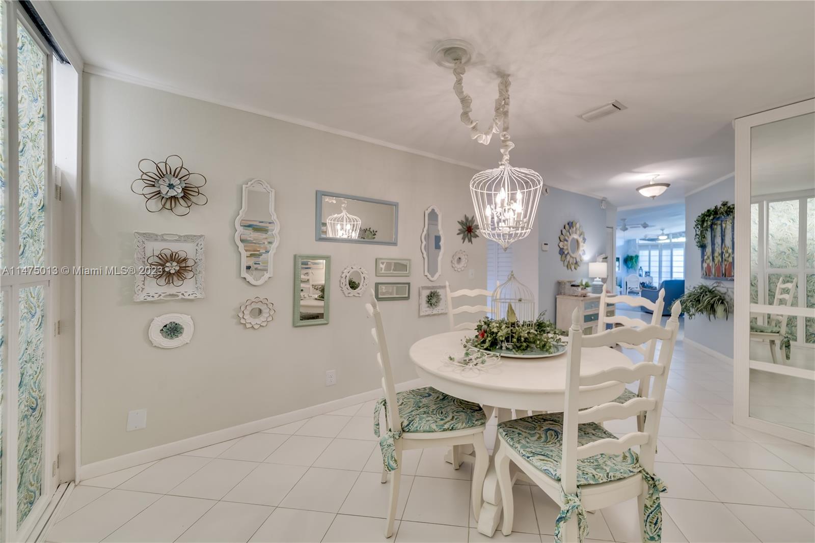 950 Mockingbird Lane, Unit 609A Plantation, FL 33324 - Photo 47 of 64 a view of a dining room with furniture