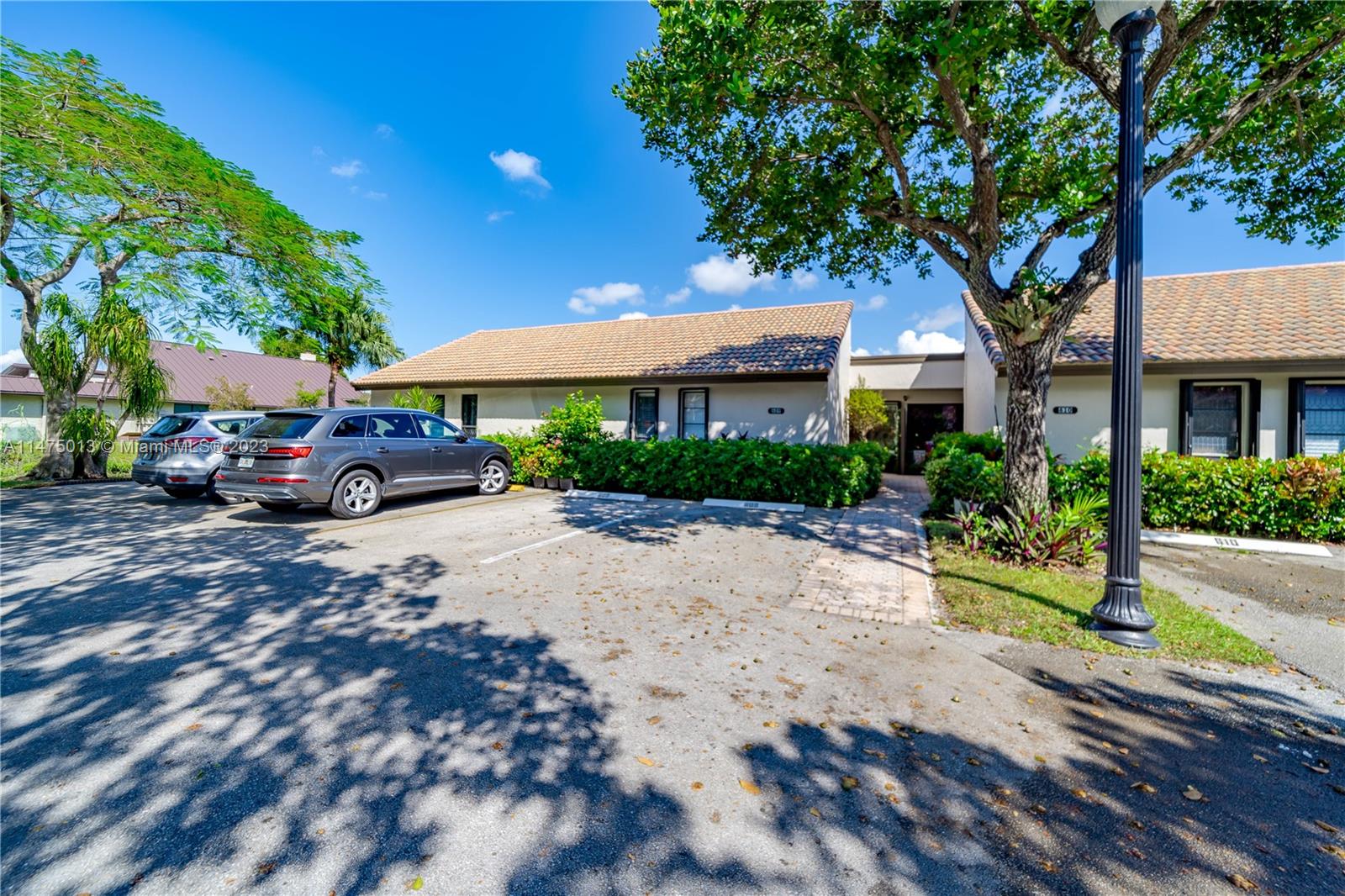 950 Mockingbird Lane, Unit 609A Plantation, FL 33324 - Photo 54 of 64 a house view with a garden space