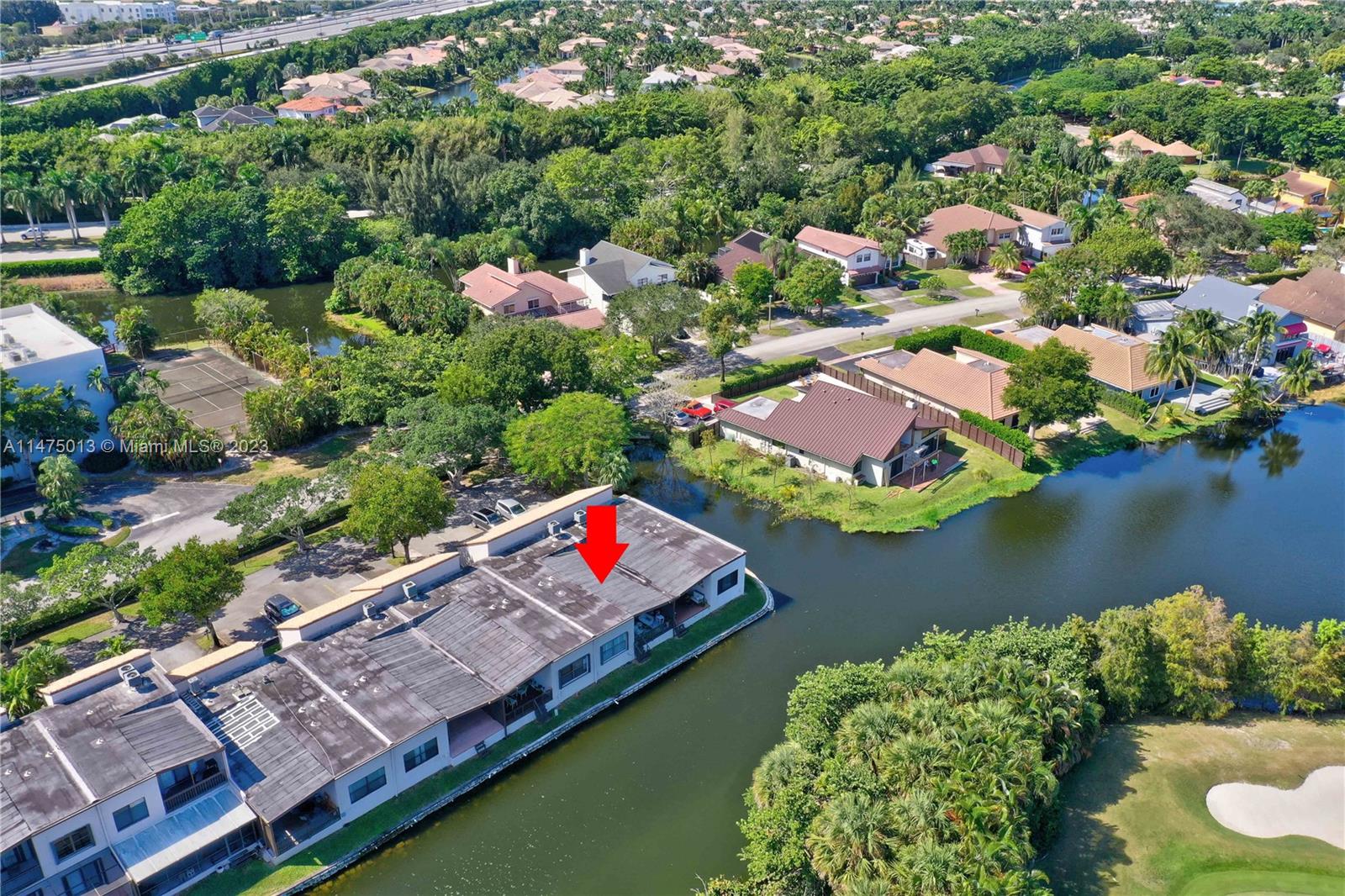 950 Mockingbird Lane, Unit 609A Plantation, FL 33324 - Photo 60 of 64 an aerial view of residential house with outdoor space and lake view