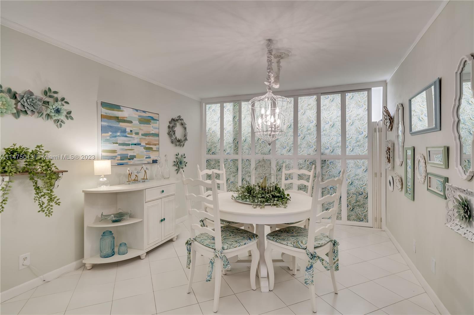 950 Mockingbird Lane, Unit 609A Plantation, FL 33324 - Photo 6 of 64 a dining room with furniture and window