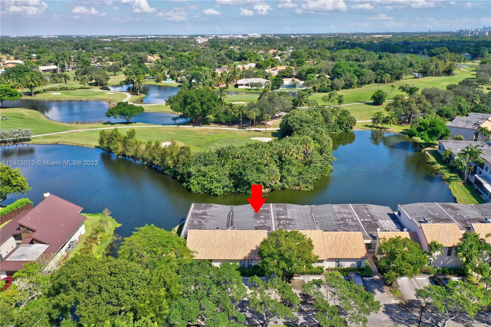 950 Mockingbird Lane, Unit 609A Plantation, FL 33324 - Photo 62 of 64 an aerial view of residential houses with outdoor space and lake view
