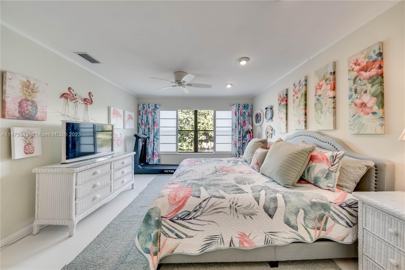 950 Mockingbird Lane, Unit 609A Plantation, FL 33324 - Photo 7 of 64 a bedroom with a bed and a couch