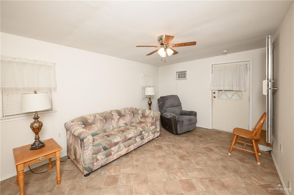 215 South Valley View Road, Unit 227 Donna, TX 78537 - Photo 15 of 18 a living room with furniture and a window