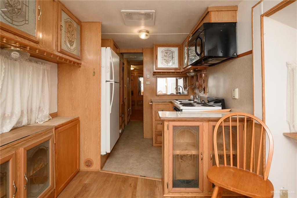 215 South Valley View Road, Unit 227 Donna, TX 78537 - Photo 6 of 18 a view of a kitchen with a sink