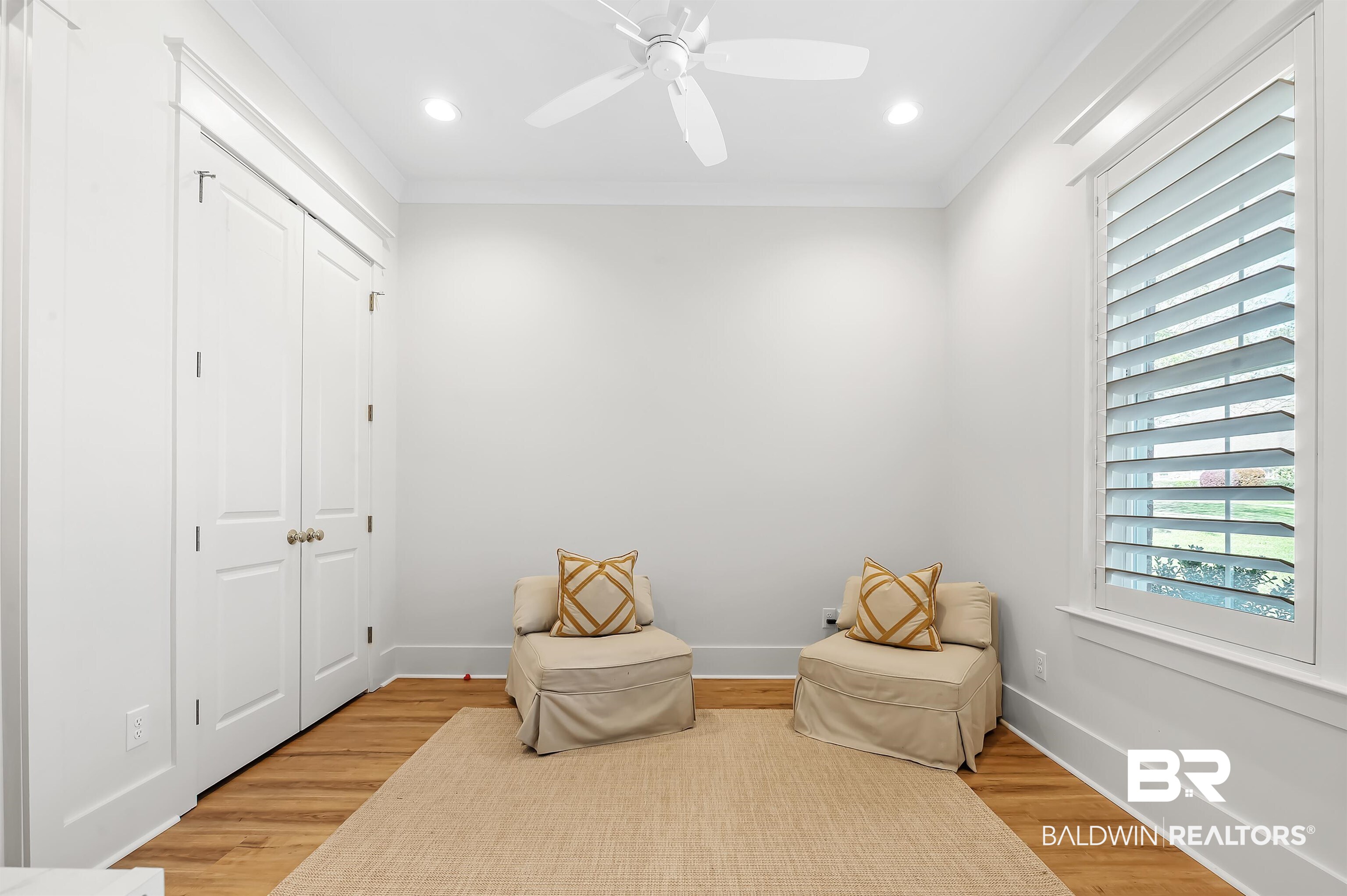 27888 Oakachoy Loop Daphne, AL 36526 - Photo 32 of 65 Sitting room with crown molding, a ceiling fan, light wood-type flooring, baseboards, and recessed lighting
