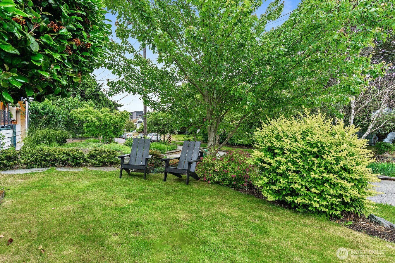 1114 North 77th Street Seattle, WA 98103 - Photo 27 of 30 a view of a bench in a garden