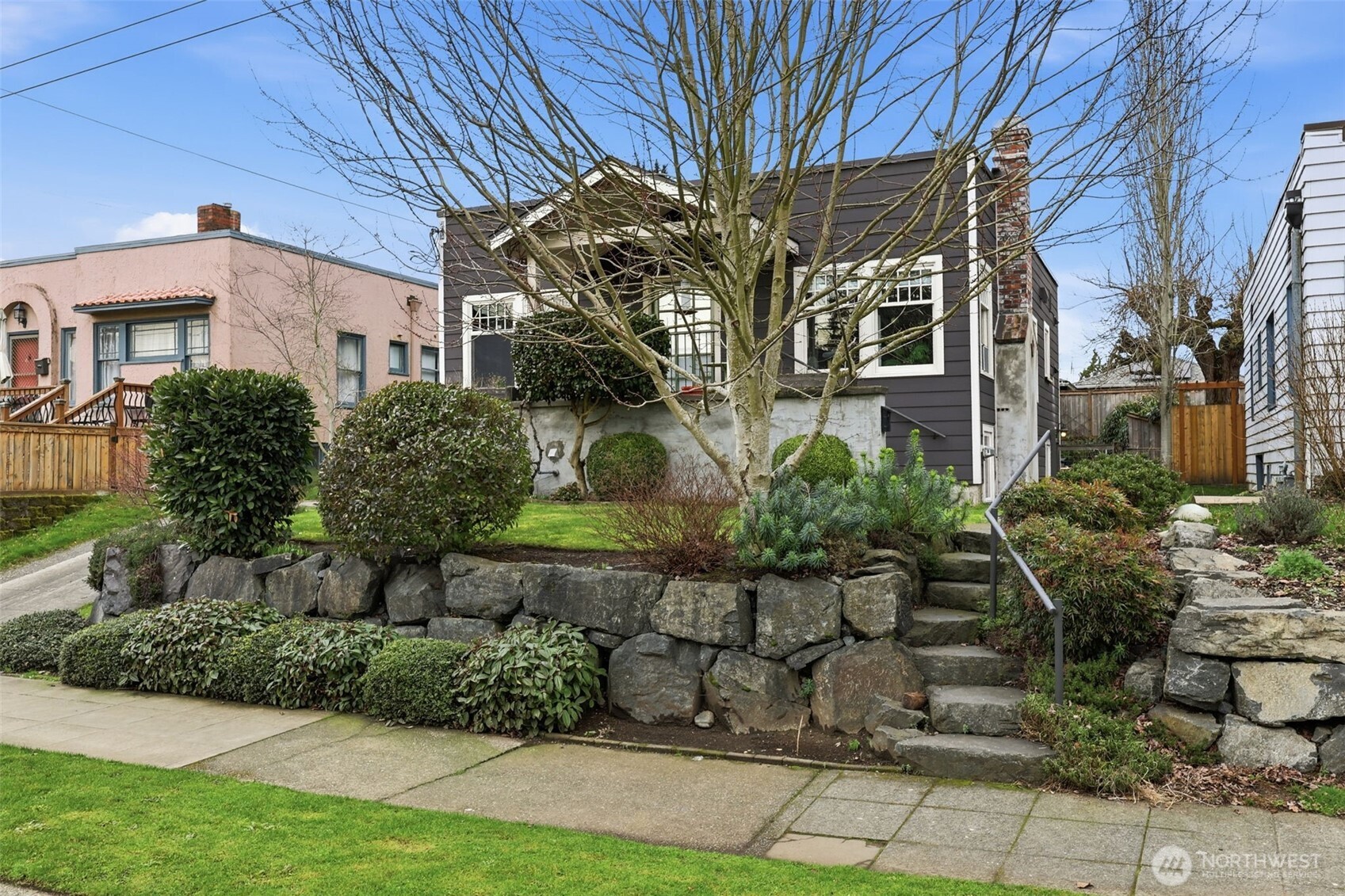 1114 North 77th Street Seattle, WA 98103 - Photo 30 of 30 a view of a building with a garden