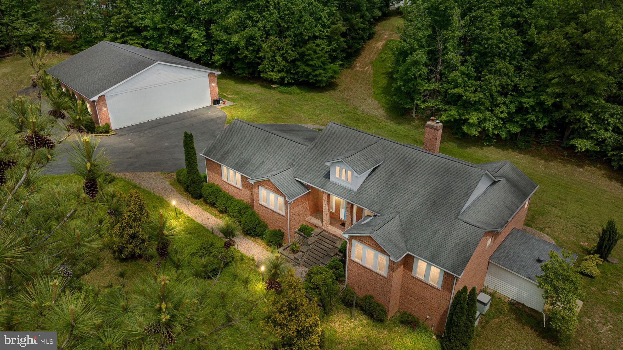 10 Piper Place Fredericksburg, VA 22405 - Photo 1 of 34 an aerial view of a house with a yard basket ball court and outdoor seating