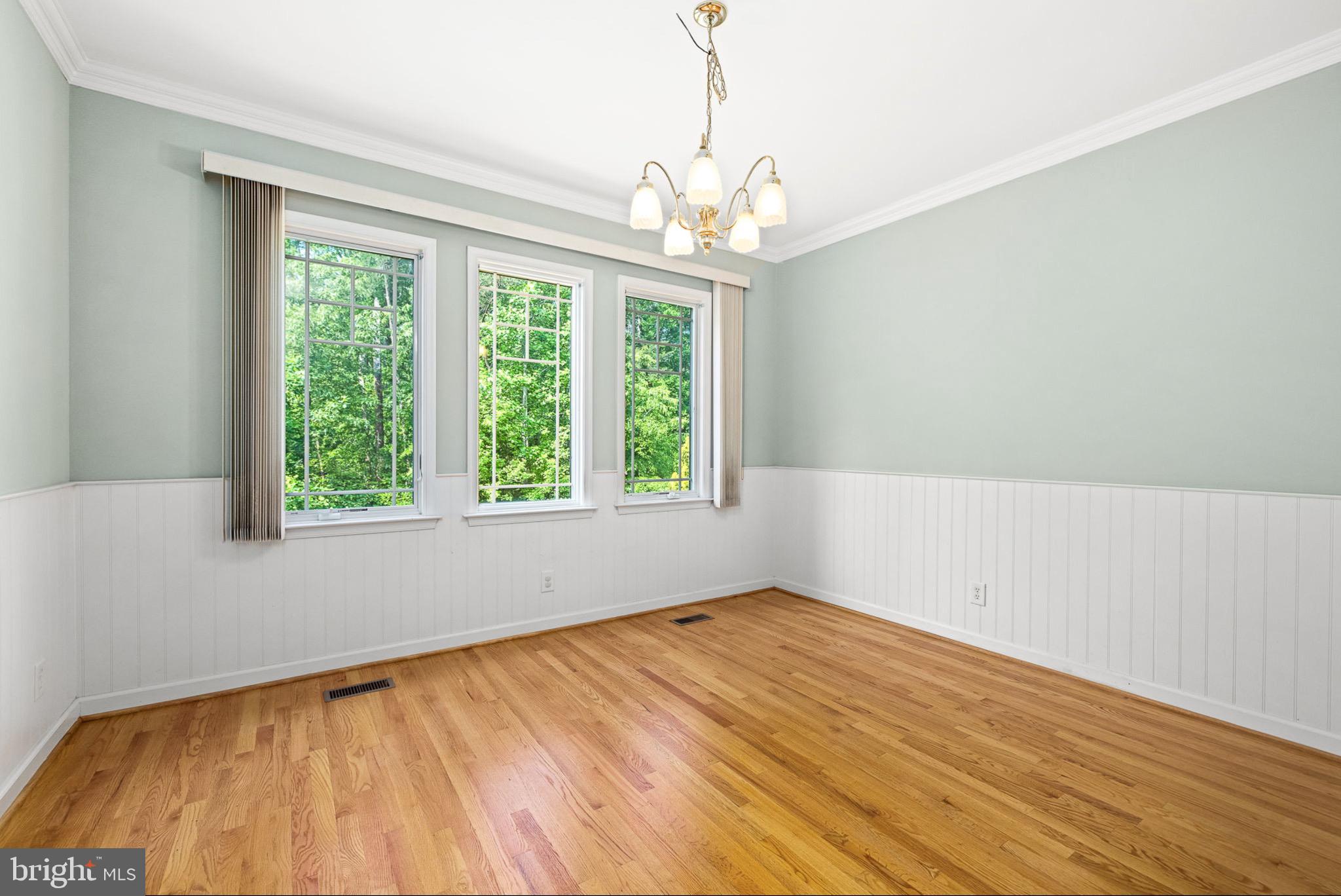 10 Piper Place Fredericksburg, VA 22405 - Photo 14 of 34 a view of an empty room with wooden floor and a window