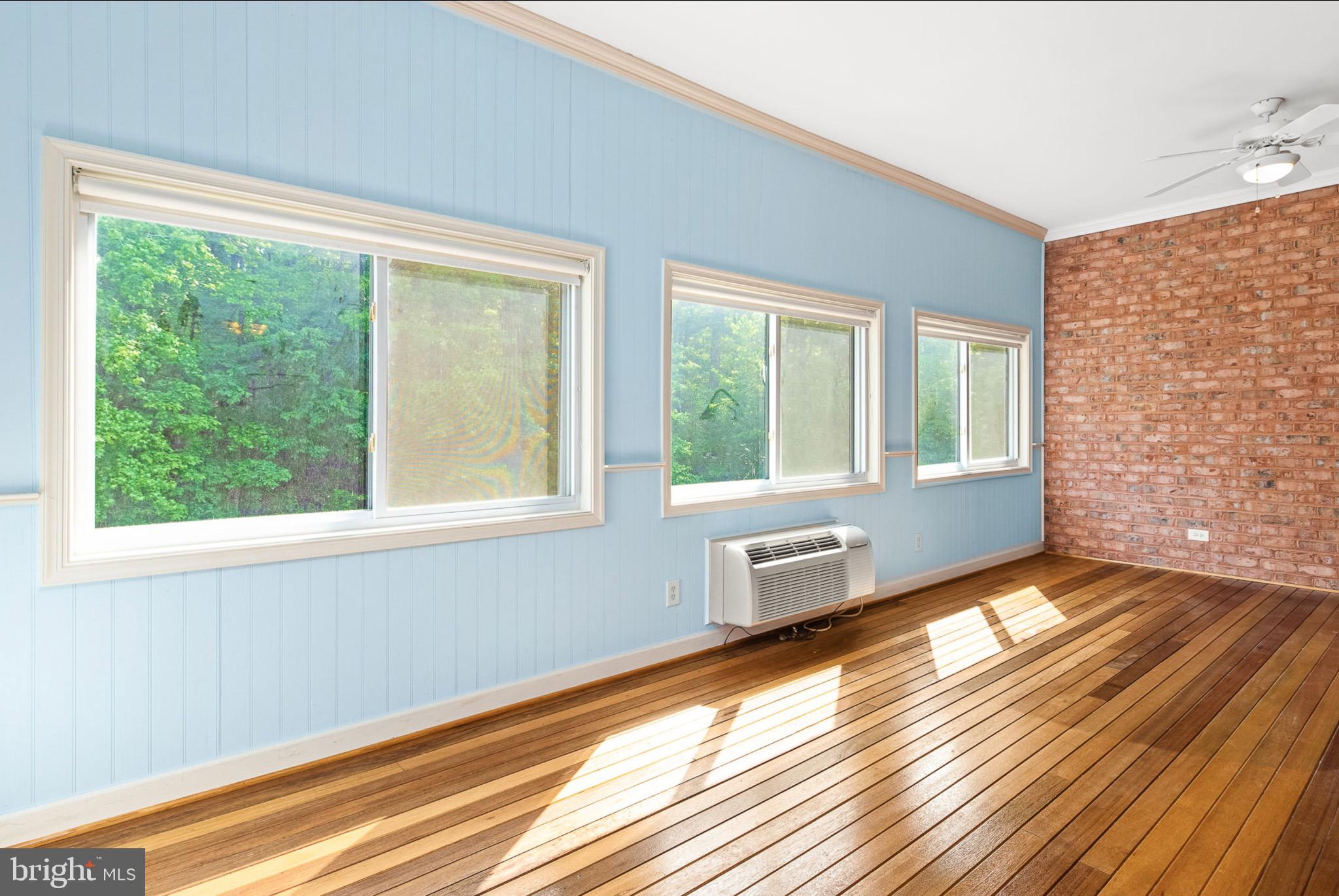10 Piper Place Fredericksburg, VA 22405 - Photo 15 of 34 a view of empty room with wooden floor and fan