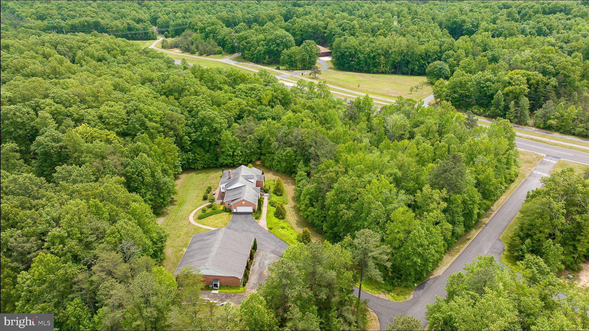 10 Piper Place Fredericksburg, VA 22405 - Photo 2 of 34 an aerial view of a house with a yard
