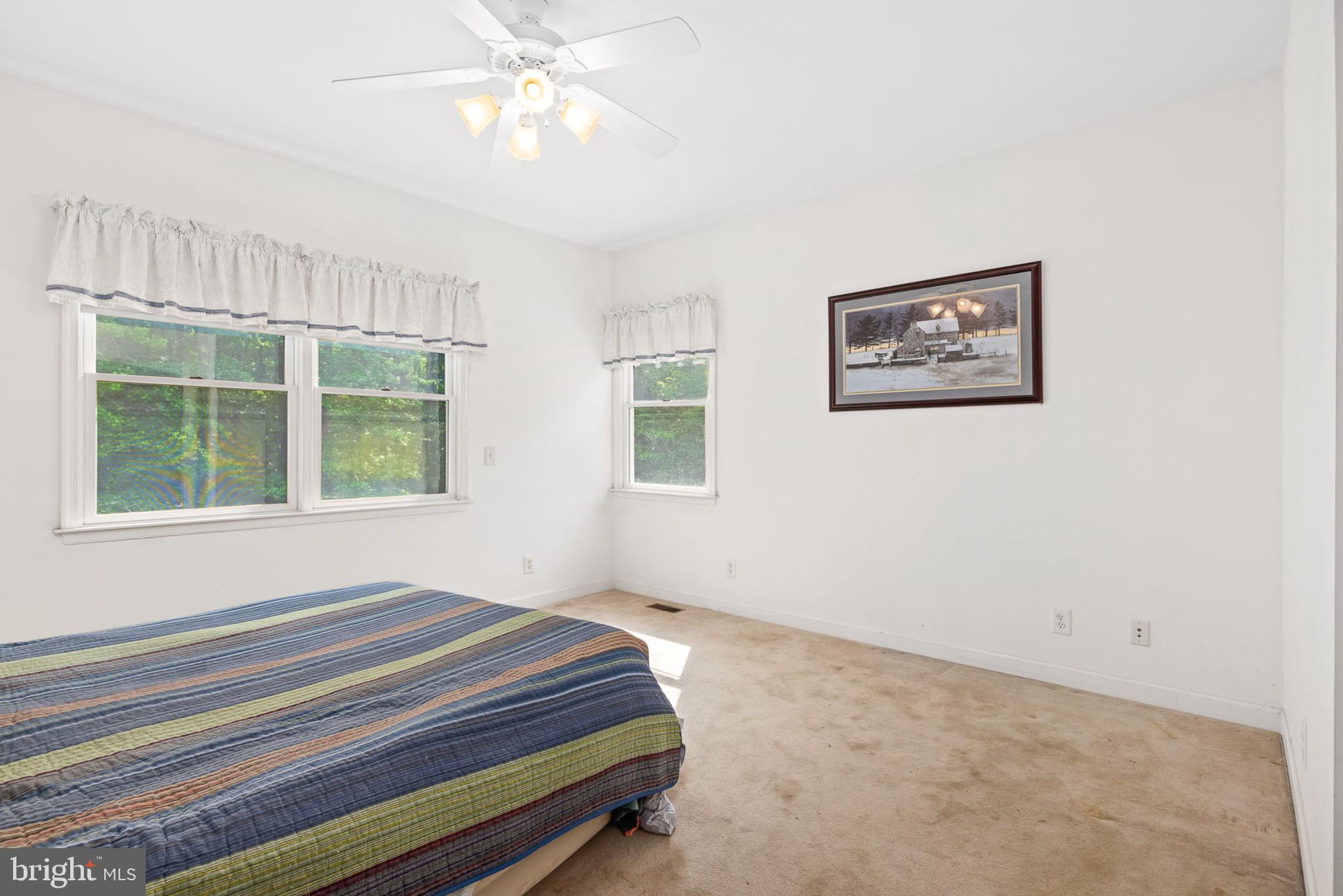 10 Piper Place Fredericksburg, VA 22405 - Photo 21 of 34 a bedroom with a bed and a window
