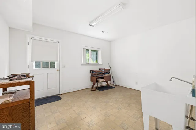 a room with furniture and window