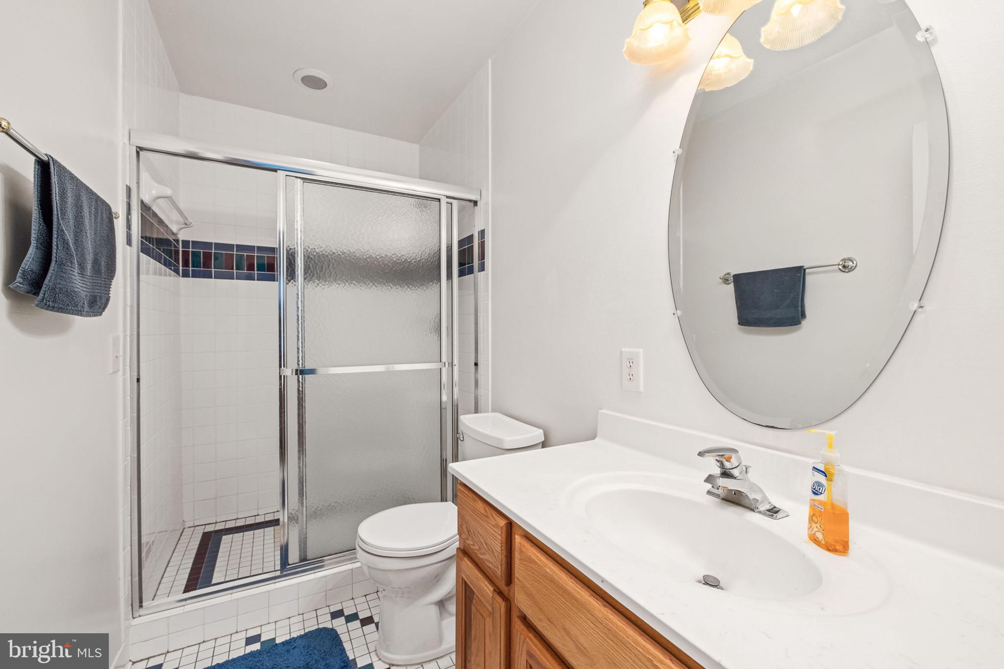 10 Piper Place Fredericksburg, VA 22405 - Photo 25 of 34 a bathroom with a sink toilet and shower
