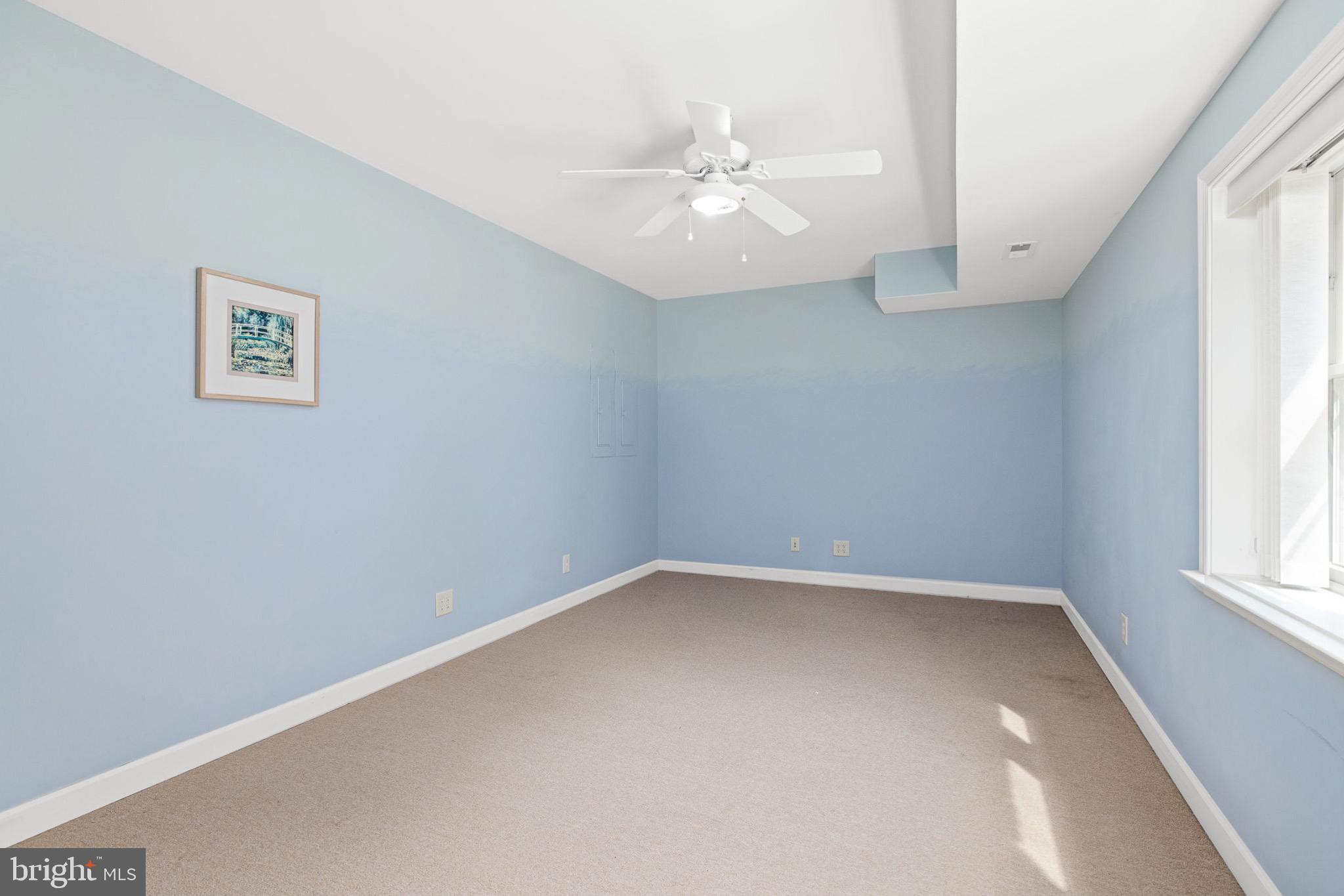 10 Piper Place Fredericksburg, VA 22405 - Photo 26 of 34 an empty room with a window and a fan