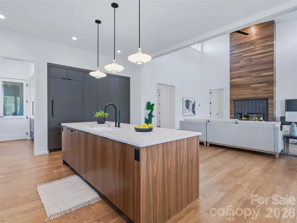 a kitchen that has a lot of cabinets in it