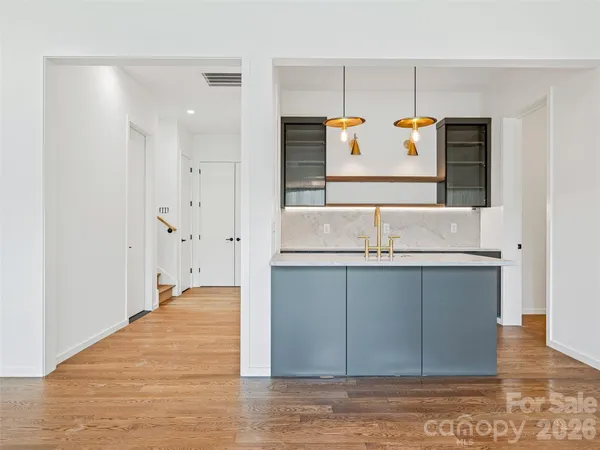 a bathroom with a sink and mirror