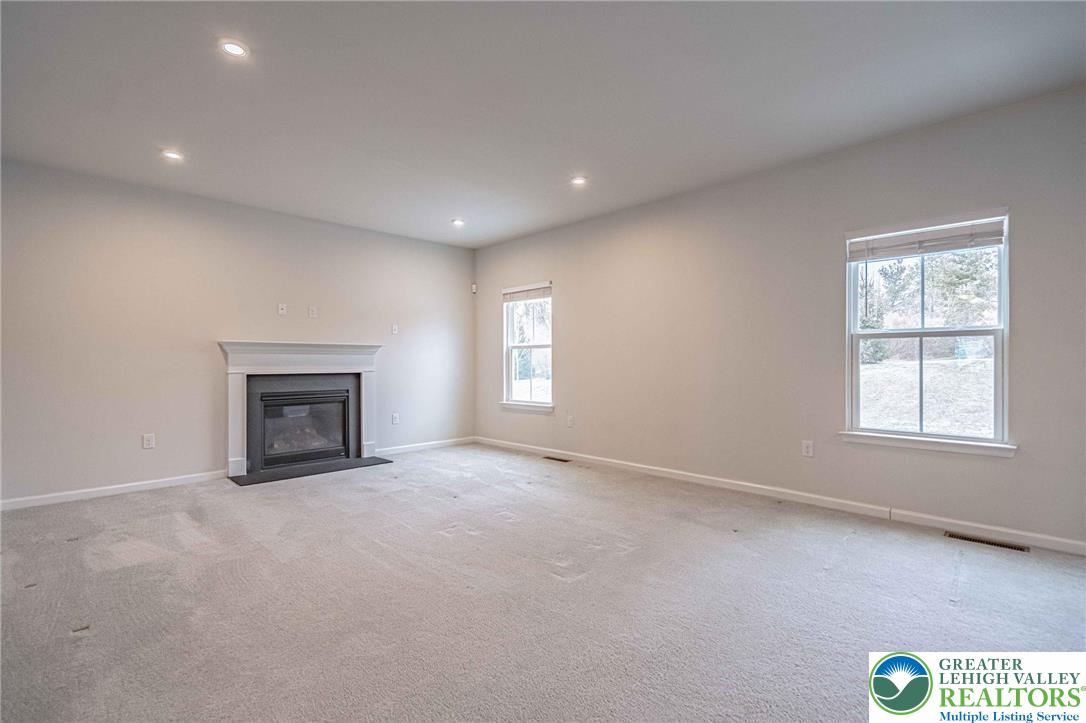 2584 Raya Way Easton, PA 18045 - Photo 11 of 50 an empty room with windows