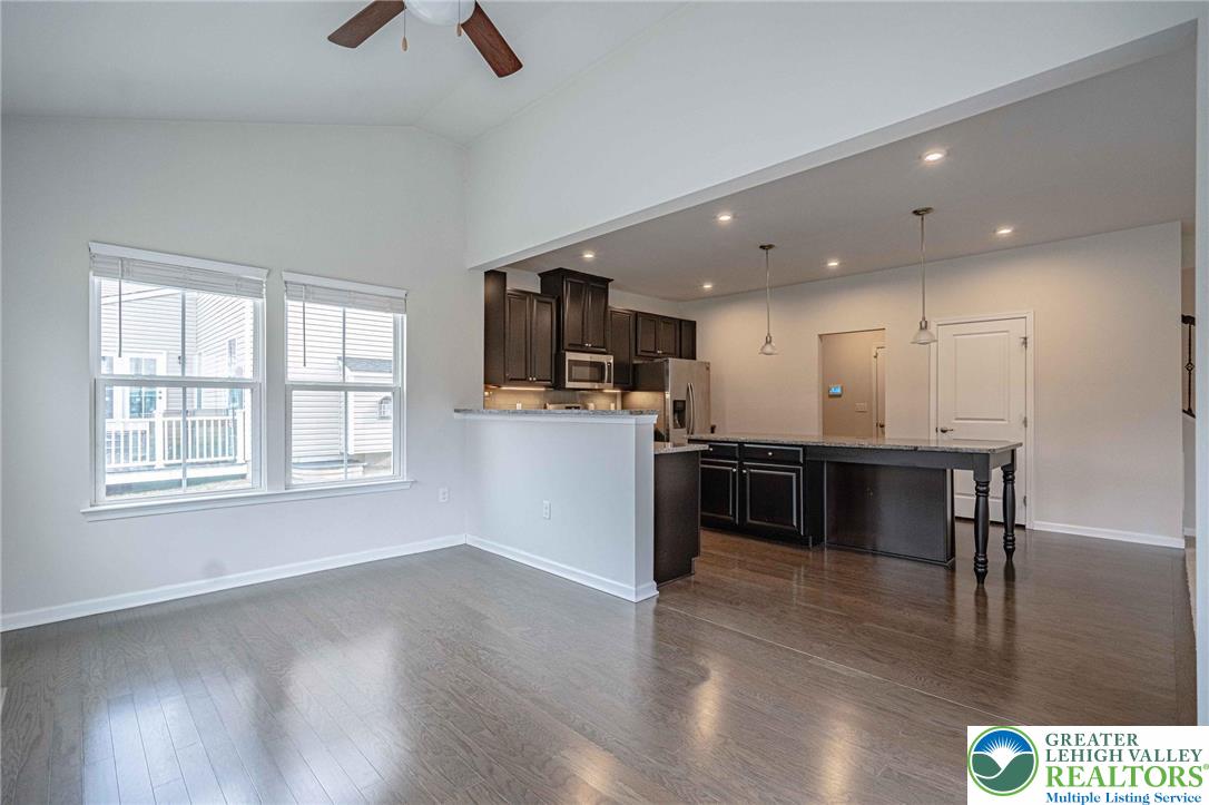 2584 Raya Way Easton, PA 18045 - Photo 18 of 50 a kitchen with a refrigerator and a stove top oven