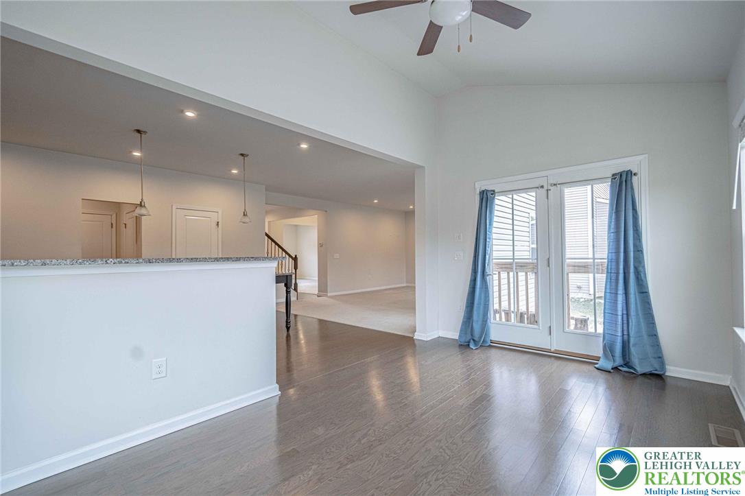 2584 Raya Way Easton, PA 18045 - Photo 19 of 50 a view of empty room with wooden floor and fan
