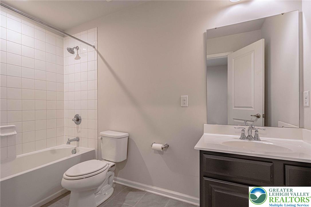 2584 Raya Way Easton, PA 18045 - Photo 24 of 50 a bathroom with a sink a toilet and shower
