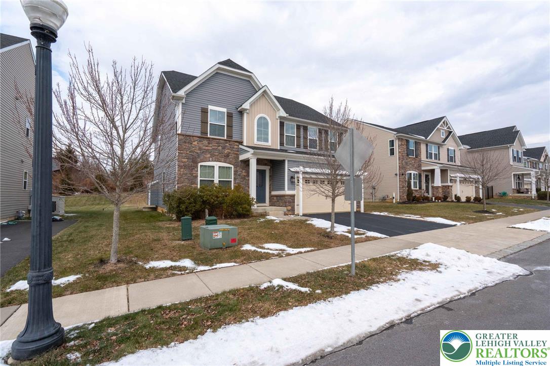 2584 Raya Way Easton, PA 18045 - Photo 3 of 50 a front view of a house with a yard