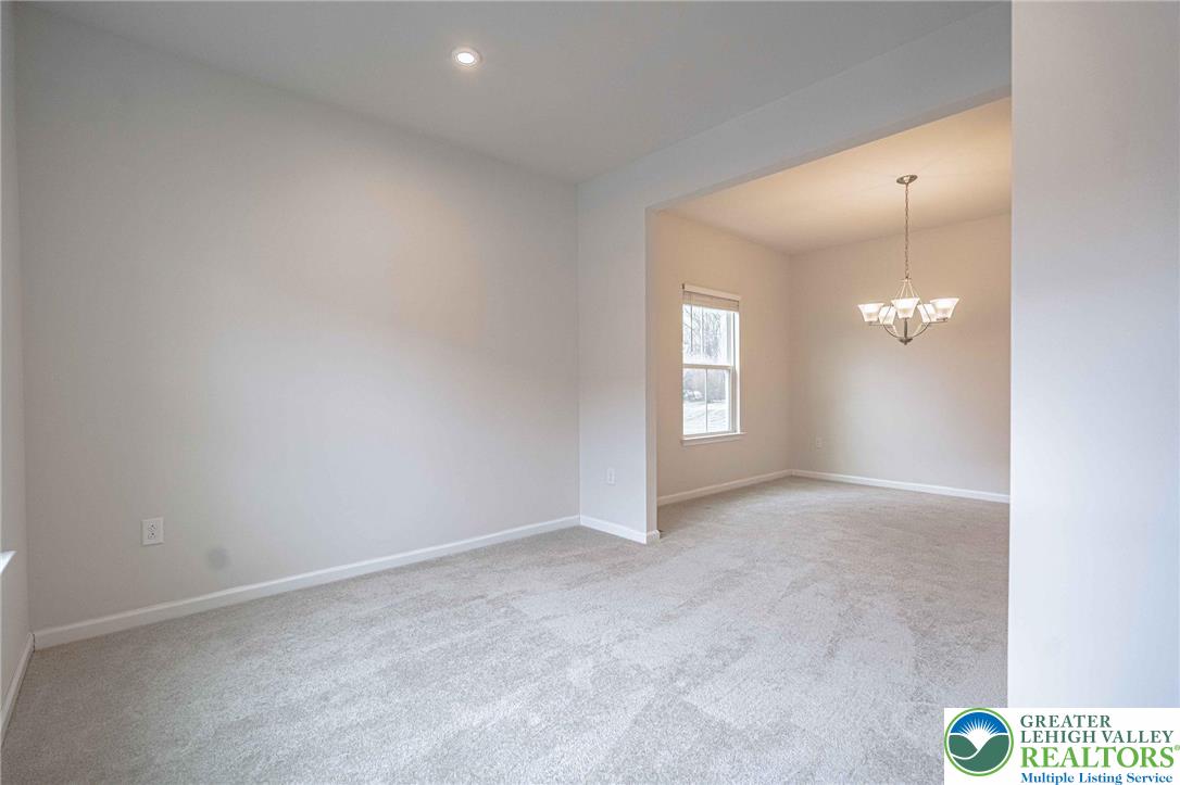 2584 Raya Way Easton, PA 18045 - Photo 7 of 50 an empty room with windows and closet