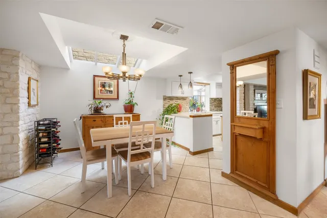 a dining room well furnished