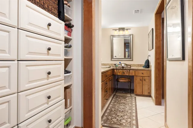 a bathroom with a sink a washer and dryer