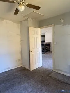 a view of a livingroom and a window