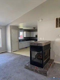 a kitchen with a stove and a sink