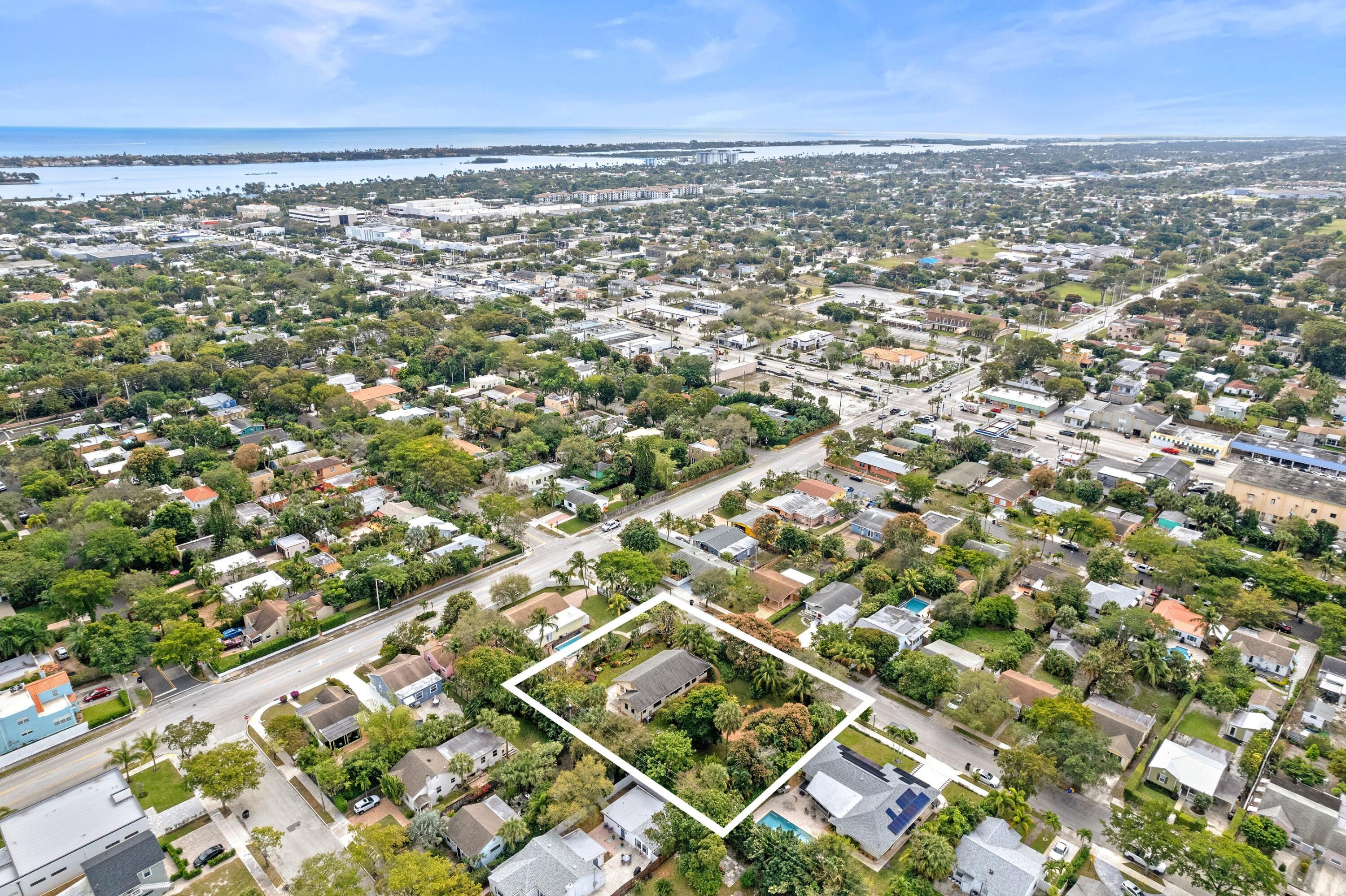 913 Sunset Road West Palm Beach, FL 33401 - Photo 8 of 12 an aerial view of residential building with parking space