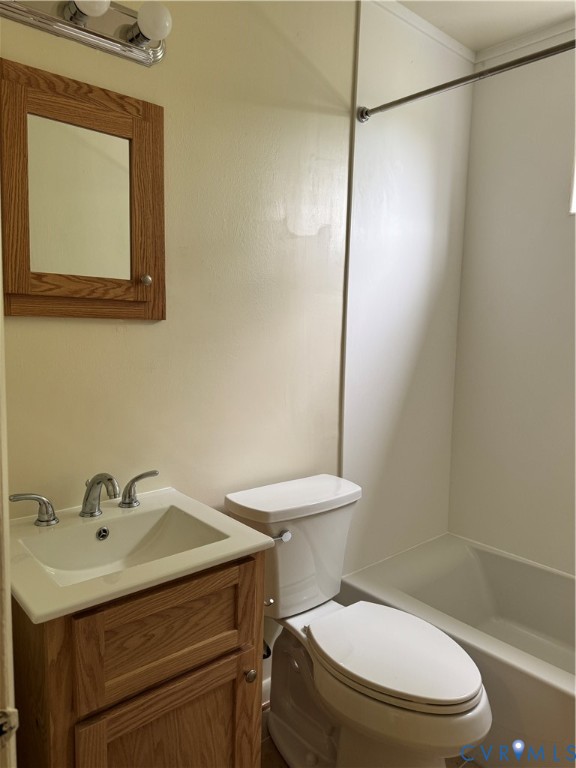 419 Roxana Road Henrico, VA 23075 - Photo 6 of 17 Bathroom featuring a light wood-finish vanity with