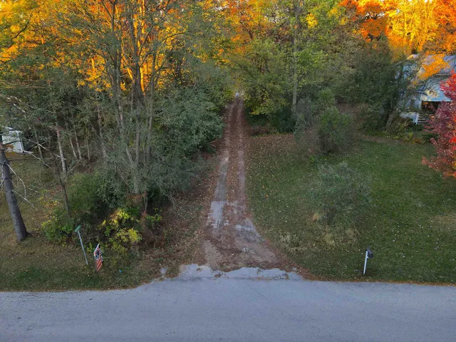 a view of an ocean from a mountain