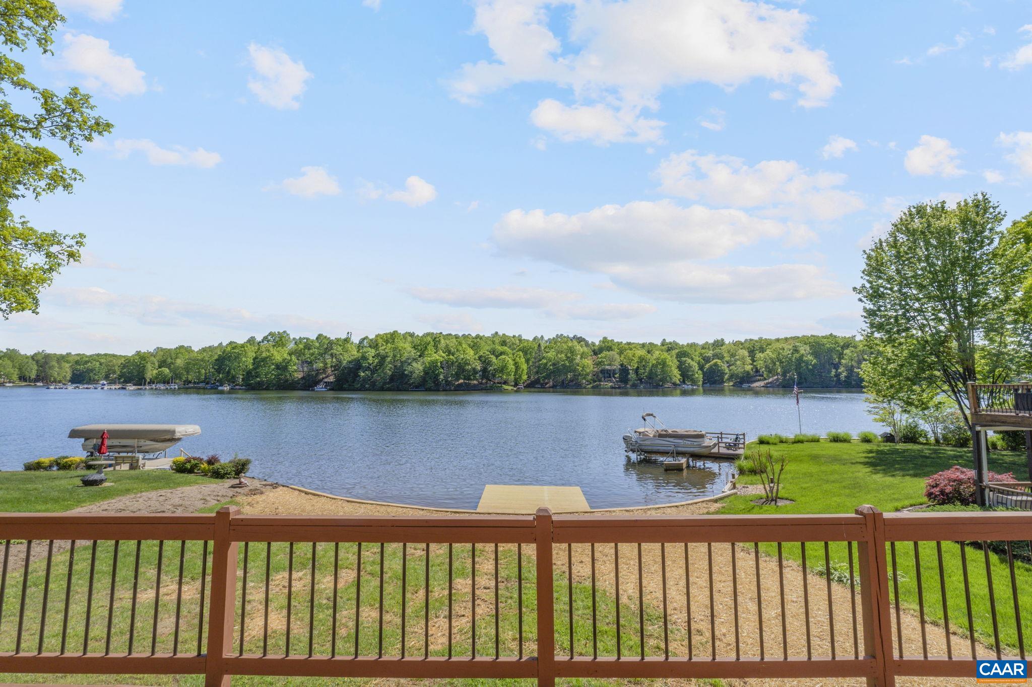 43 Tanglewood Road Palmyra, VA 22963 - Photo 15 of 64 a view of a lake with a yard